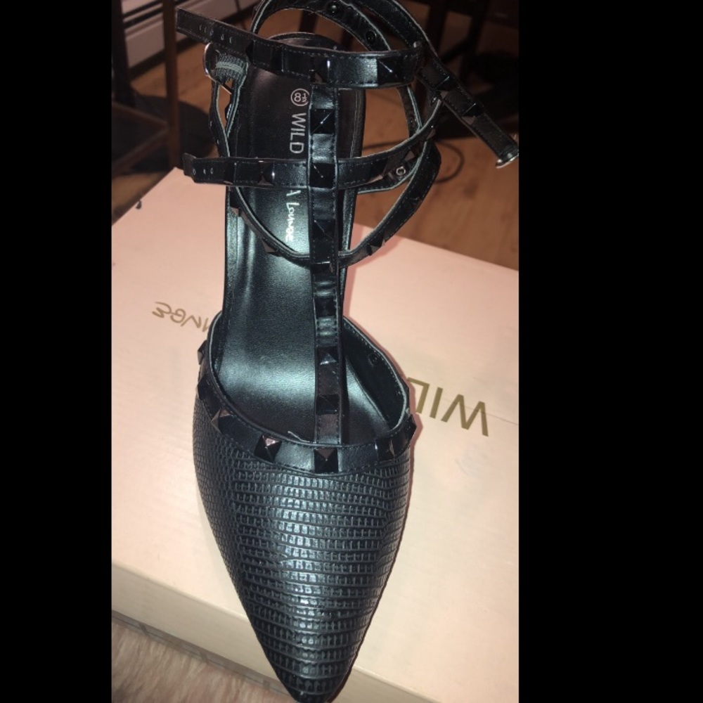 Black pointy toed heels